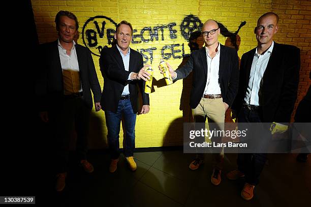 Matthias Baeumer, director Puma Germany, Hans Joachim Watzke, CEO of Borussia Dortmund, Franz Koch, CEO of Puma, and Carsten Cramer, marketing...