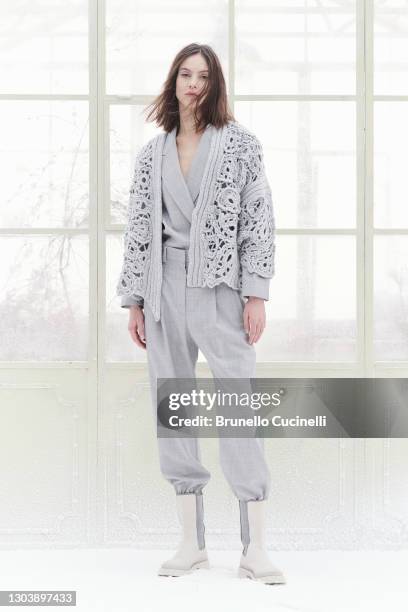 In this image released on February the 24th, a model poses at the Brunello Cucinelli Fashion Show during the Milan Fashion Week Fall/Winter 2021/2022...