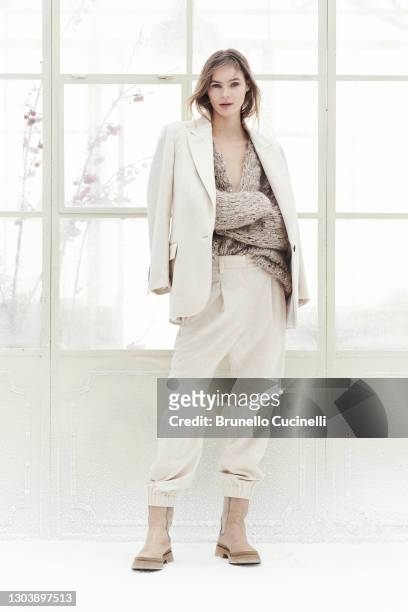 In this image released on February the 24th, a model poses at the Brunello Cucinelli Fashion Show during the Milan Fashion Week Fall/Winter 2021/2022...