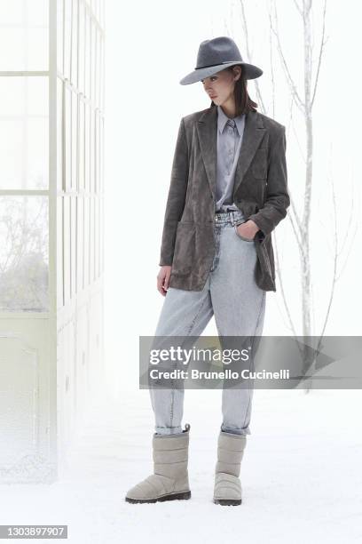 In this image released on February the 24th, a model poses at the Brunello Cucinelli Fashion Show during the Milan Fashion Week Fall/Winter 2021/2022...