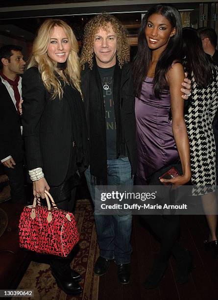 Lexi Quaas, musician David Bryan of Bon Jovi and Victoria's Secret model Sessilee Lopez attend the Yellow Fever launch party at RdV on February 19,...