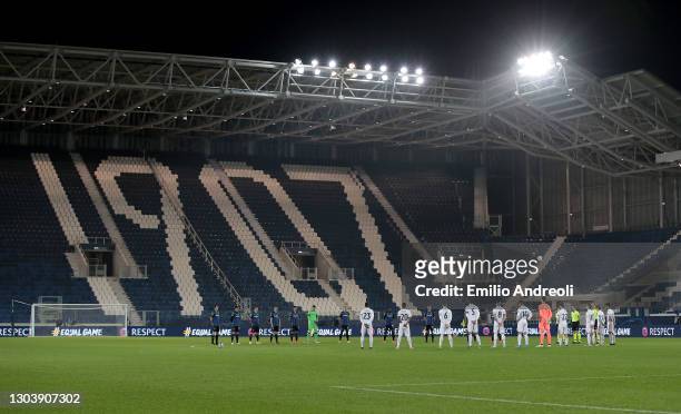 Both team's and Official's stand for a minute's silence in memory of the victims of COVID 19 who have passed away prior to the UEFA Champions League...