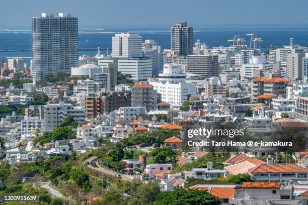 the residential district by the sea in naha city of japan - okinawa prefecture stock pictures, royalty-free photos & images