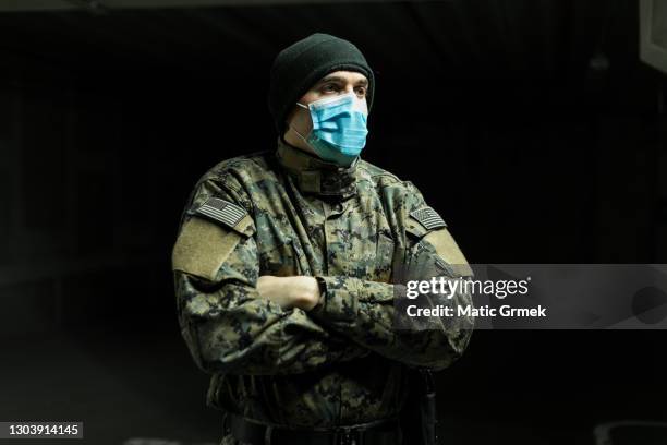 soldier wearing face mask - military uniform close up stock pictures, royalty-free photos & images