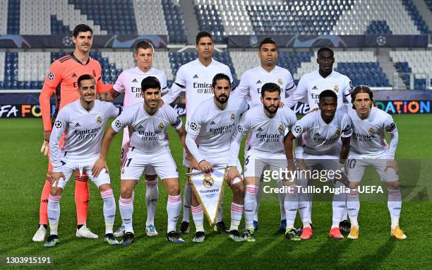 Players of Real Madrid pose for a team photograph prior to the UEFA Champions League Round of 16 match between Atalanta and Real Madrid at Gewiss...