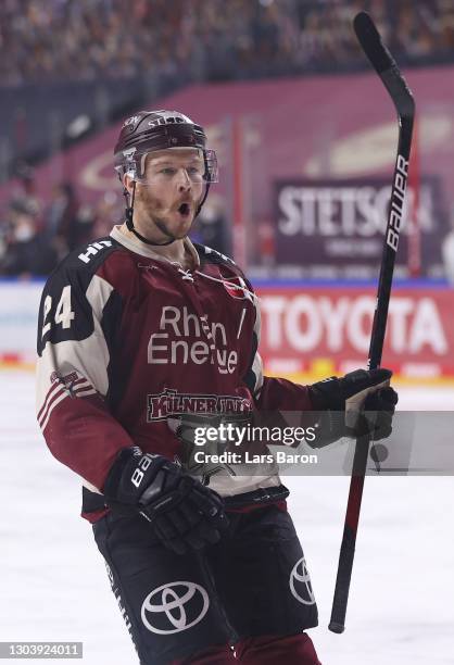 Zachary Sill of Koeln celebrates after scoring his teams second goal during the DEL match between Koelner Haie and Krefeld Pinguine at LANXESS Arena...