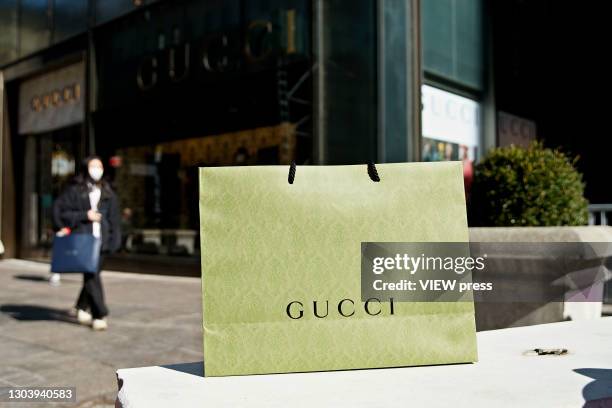 Gucci bag is seen in front the Gucci store on Fifth Avenue in Trump Tower on February 24, 2021 in New York City. Gucci extended its lease in the...