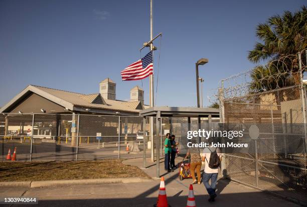 The U.S. Flag flies at half staff at a port of entry at the U.S.-Mexico border on February 24, 2021 in Brownsville, Texas. U.S. President Joe Biden...