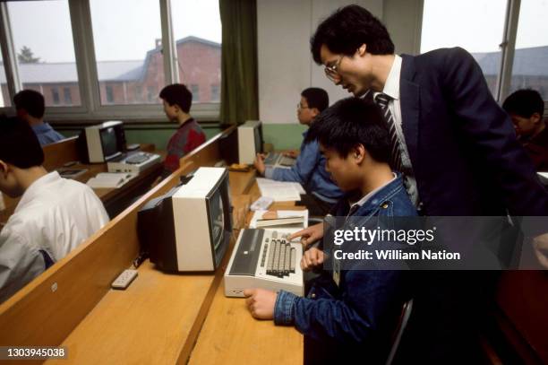 Computer Boy Instructor Teachers Desk With Computer Photos and Premium High Res Pictures ...