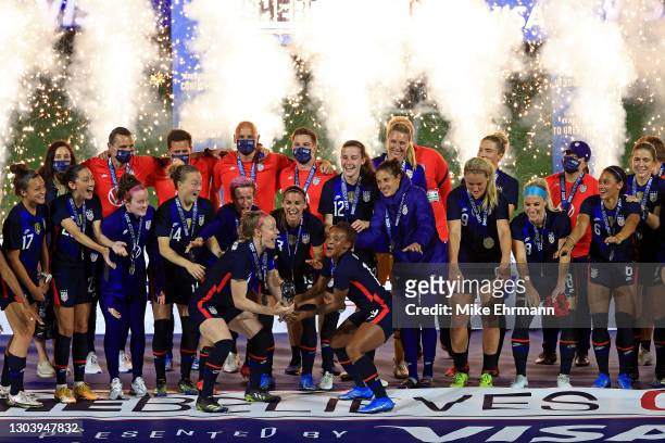 The United States celebrate winning the SheBelieves Cup at Exploria Stadium on February 24, 2021 in Orlando, Florida.
