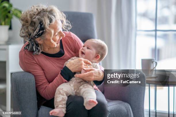 grandmother with grandchild - gran stock pictures, royalty-free photos & images