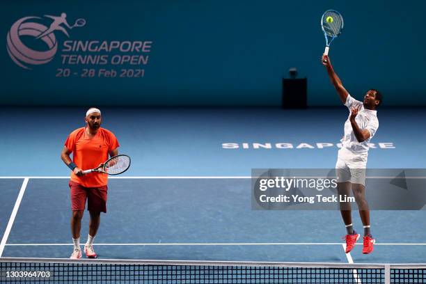 Purav Raja and Ramkumar Ramanathan of India return the ball in their Men's Doubles Quarterfinal match against Sander Gille and Joran Vliegen of...