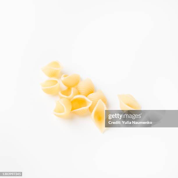 pasta on white background - carbohydrate food type stock pictures, royalty-free photos & images