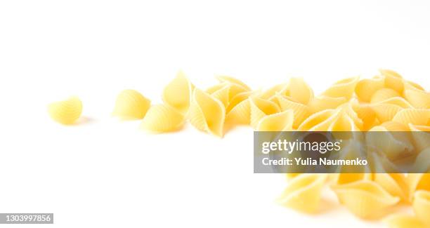 pasta on white background - carbohydrate food type stock pictures, royalty-free photos & images