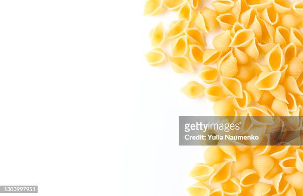 pasta on white background - carbohydrate food type stock pictures, royalty-free photos & images