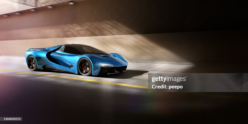 Blue Sports Car fährt mit hoher Geschwindigkeit durch Tunnel