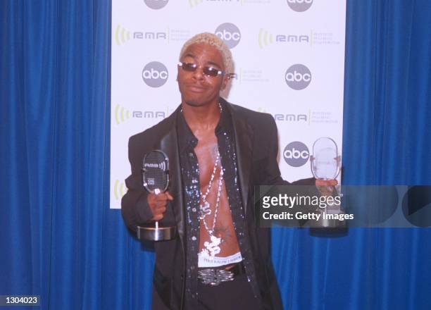 Rapper Sisqo poses with his awards backstage at the 2000 Radio Music Awards at the Alladin Hotel November 4, 2000 in Las Vegas, NV. Sisqo won two...