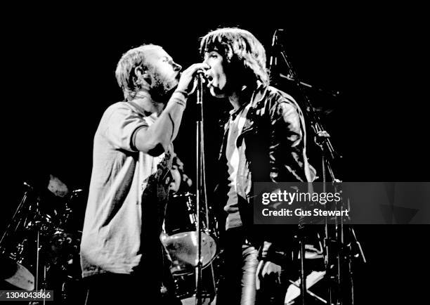 Phil Collins joins Peter Gabriel on stage at the Fete de l'Humanite in Paris, France on September 10th, 1977. It was the first time they had...