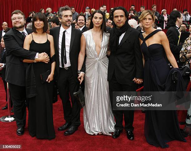 Alfonso Cuaron with wife Annalisa Bugliani, Director Alejandro Gonzalez Inarritu and wife Maria Eladia, and Director Guillermo del Toro with wife