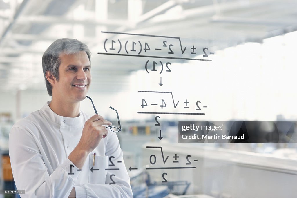 Scientist using touch screen in lab