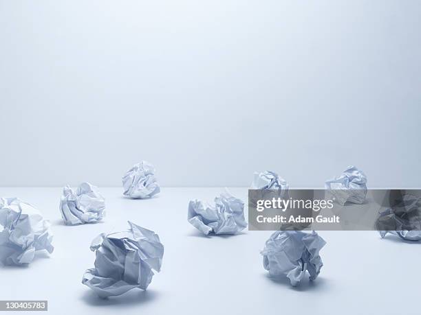 crumpled balls of paper - papierkugel stock-fotos und bilder