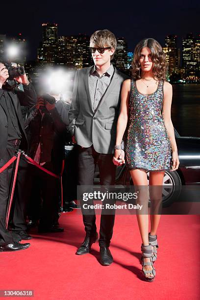 celebrity walking on red carpet - famous stock pictures, royalty-free photos & images