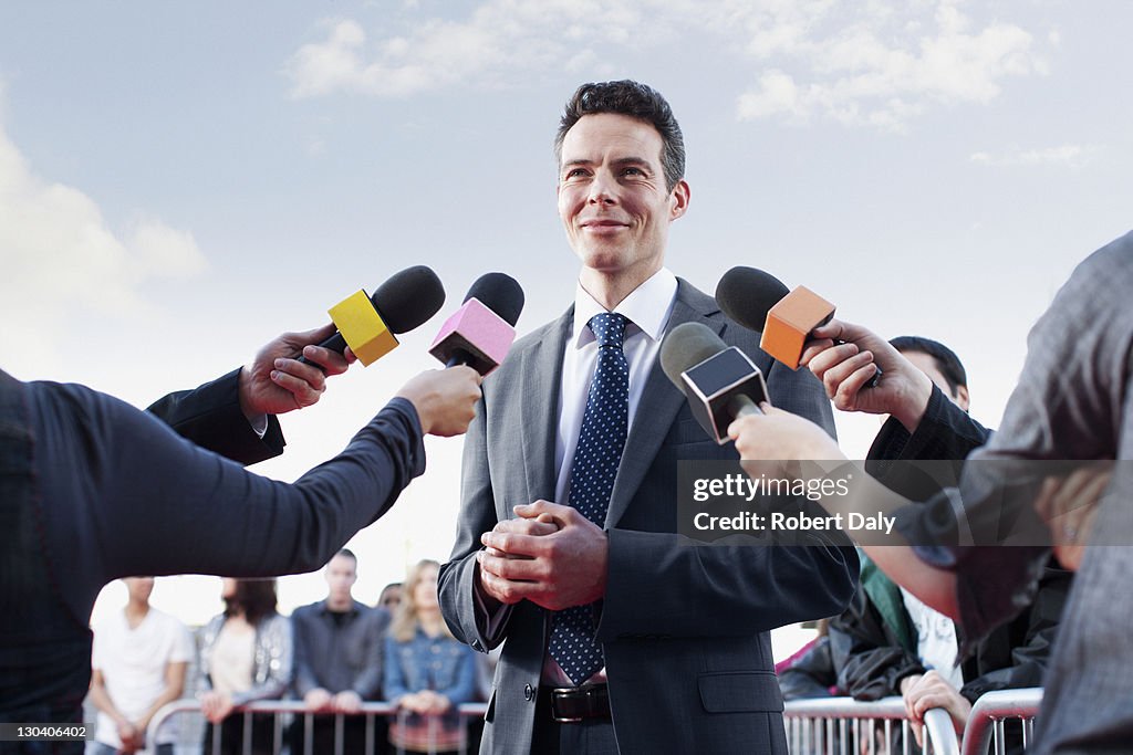Politician speaking to reporters
