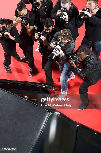 paparazzi taking photos of celebrity's car - paparazzi stock pictures, royalty-free photos & images
