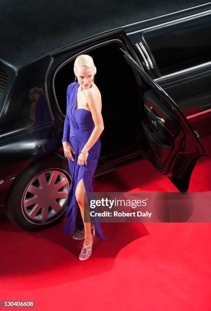 celebrity emerging from limo on red carpet - premiere stock pictures, royalty-free photos & images