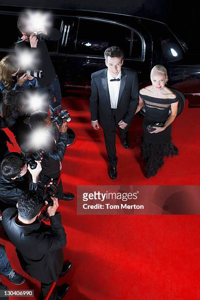 celebrities walking on red carpet - limo night stock pictures, royalty-free photos & images
