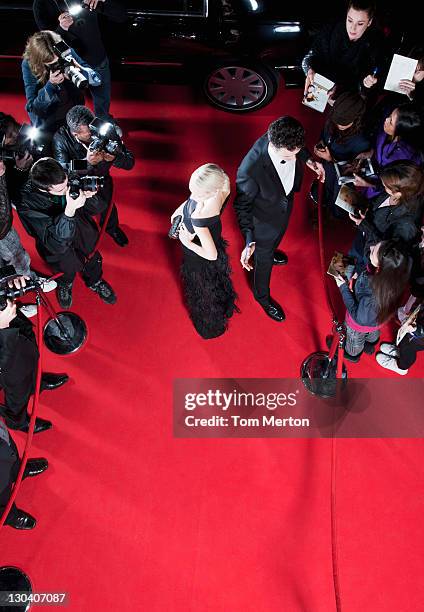 celebrities working on red carpet - red carpet stock pictures, royalty-free photos & images