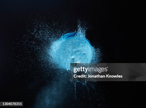 Exploding blue water balloon Exploding blue water balloon