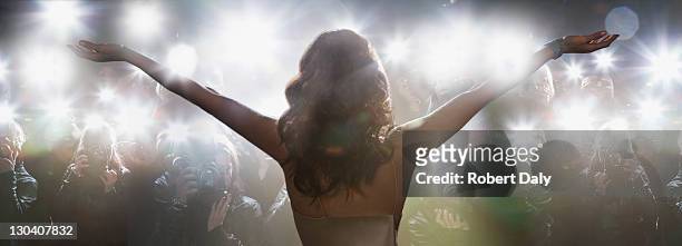 celebrity posing for paparazzi - red carpet event stock pictures, royalty-free photos & images
