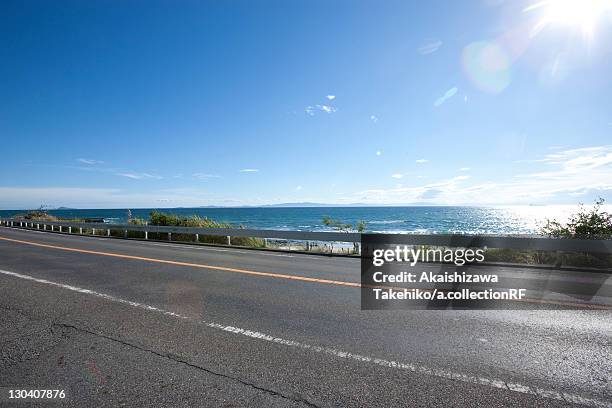 road by sea, aichi prefecture, japan - aichi prefecture stock pictures, royalty-free photos & images