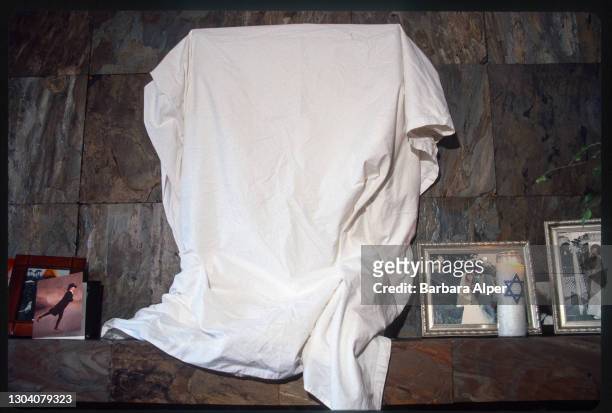 Mirror is covered by a white cloth during the ritual of sitting Shiva, a period of Jewish mourning circa 1998.
