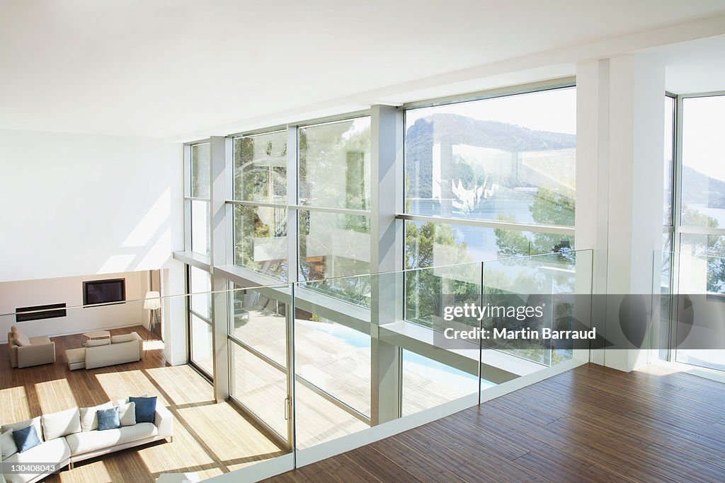 Banister overlooking modern living space