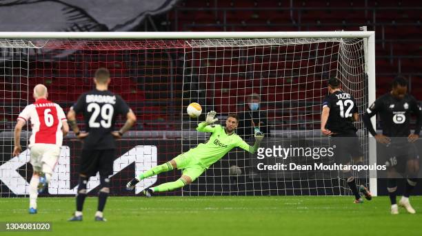 Lille player Yusuf Yazıcı scores his penalty past Ajax goalkeeper Maarten Stekelenburg during the UEFA Europa League Round of 32 match between AFC...