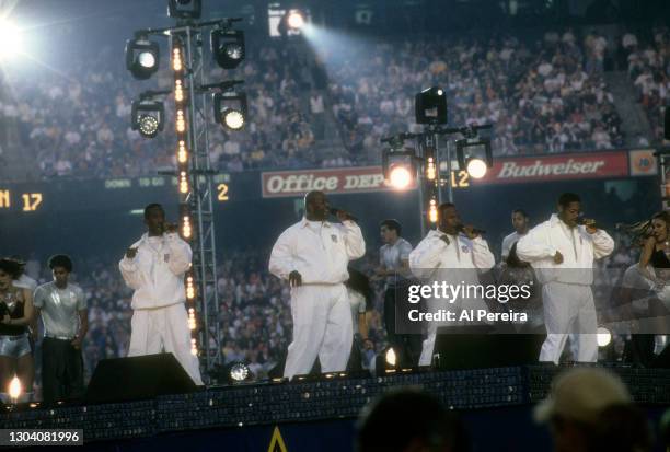 Boyz II Men perform at The Halftime Show, "A Tribute To Motown's 40th Anniversary" during the game between the Green Bay Packers and the Denver...