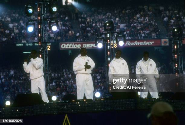 Boyz II Men perform at The Halftime Show, "A Tribute To Motown's 40th Anniversary" during the game between the Green Bay Packers and the Denver...