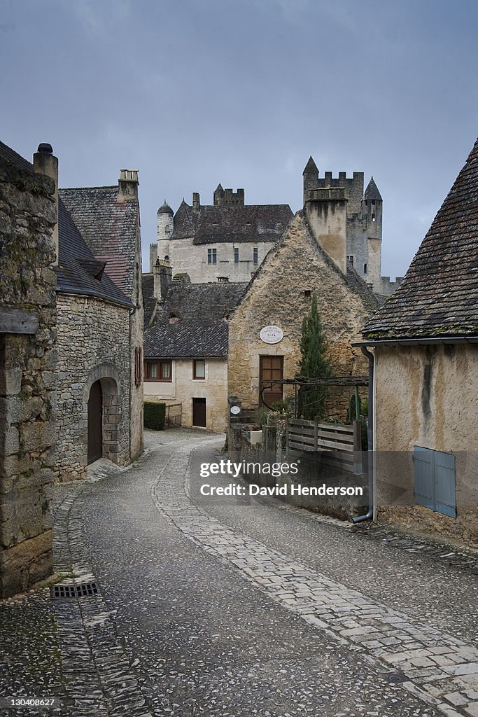 Cobbled city street with old buildings