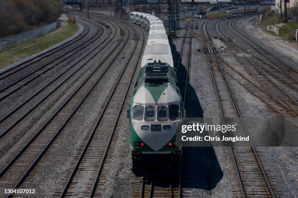 passenger railway train bending through wide rail junction - toronto transit stock pictures, royalty-free photos & images