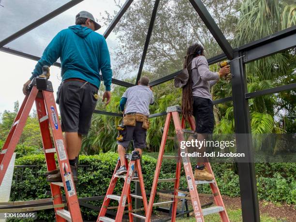series: building a screen enclosure for a lanai in a backyard - enclosure stock pictures, royalty-free photos & images