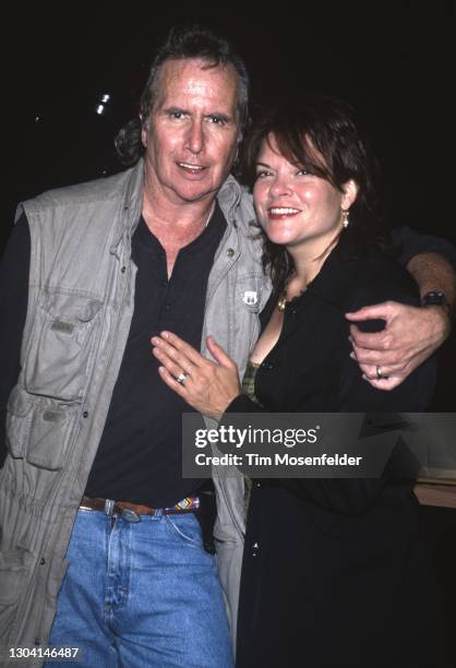 John Stewart and Rosanne Cash pose at the Coconut Grove on August 20, 1997 in Santa Cruz, California.