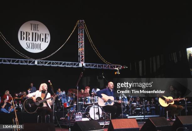 Arcy Wretzky, Jimmy Chamberlin, Billy Corgan, and James Iha of The Smashing Pumpkins perform during Neil Young's Bridge School Benefit at Shoreline...