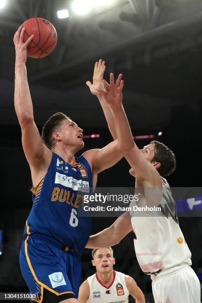 Matthew Hodgson of the Bullets drives at the basket during the NBL Cup match between the Brisbane Bullets and the Illawarra Hawks at John Cain Arena...