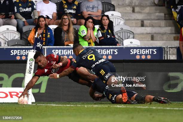 Sevu Reece of the Crusaders scores a try during the round one Super Rugby Aotearoa match between the Highlanders and the Crusaders at Forsyth Barr...