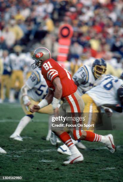 Russ Francis of the San Francisco 49ers in action against the San Diego Chargers during an NFL football game December 11, 1982 at Candlestick Park in...