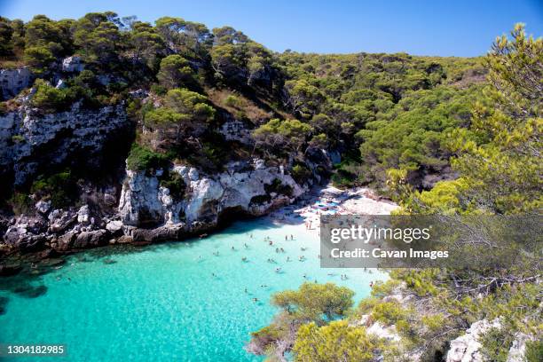 menorca island. boats in cala macarella - minorca stock pictures, royalty-free photos & images