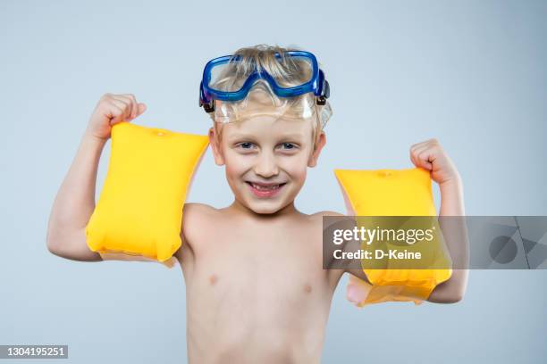 swimming pool - arm band stock pictures, royalty-free photos & images