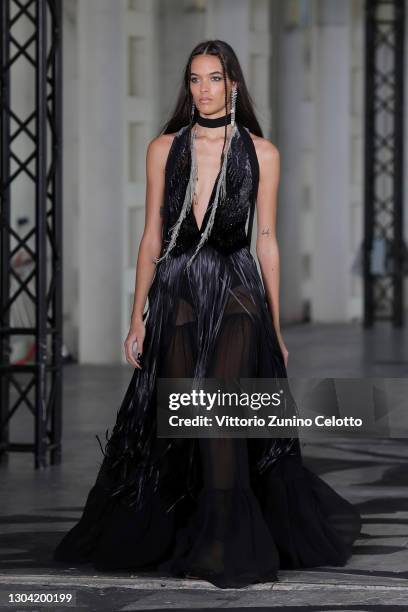 In this image released on February the 26th, a model walks the runway at the Etro Fashion Show during the Milan Fashion Week Fall/Winter 2021/2022 on...